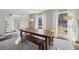 Cozy dining area adjacent to the living room, with natural light and stylish decor at 2805 Roxburgh Dr, Roswell, GA 30076