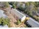 Overhead view of the complex with mature landscaping, multiple apartment buildings, and ample parking at 3236 Henderson Mill Rd, Atlanta, GA 30341