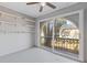 Cozy sunroom with tiled floors, built-in shelves, and large sliding doors offering serene outdoor views at 3236 Henderson Mill Rd, Atlanta, GA 30341