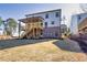 Exterior of home showing wooden deck, brick foundation, and spacious backyard area at 3255 Hilltop Cir, Marietta, GA 30066