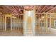 Spacious unfinished basement area with exposed framing and a staircase at 3255 Hilltop Cir, Marietta, GA 30066