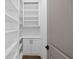 Spacious walk-in pantry with ample shelving and storage cabinets at 3255 Hilltop Cir, Marietta, GA 30066