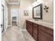Elegant bathroom with granite countertops and modern fixtures at 1605 Camden Cove Dr, Cumming, GA 30040