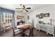 Bright breakfast nook featuring table, chairs, window with accent drapes, and decor at 1605 Camden Cove Dr, Cumming, GA 30040