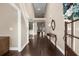 Elegant foyer with hardwood floors, soaring ceilings, and a view to the living spaces at 1605 Camden Cove Dr, Cumming, GA 30040