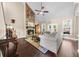 Inviting living room with a stone fireplace and comfortable seating at 1605 Camden Cove Dr, Cumming, GA 30040