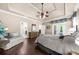 Luxurious main bedroom featuring a sitting area and private entry to the outdoors at 1605 Camden Cove Dr, Cumming, GA 30040