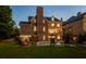 Outdoor space with a firepit and a sparkling pool at 4992 Price Dr, Suwanee, GA 30024