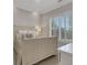 Cozy bedroom featuring a classic design, large windows, and natural light at 4992 Price Dr, Suwanee, GA 30024