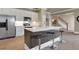 Gourmet kitchen with stainless steel appliances, island, and white cabinetry at 4992 Price Dr, Suwanee, GA 30024