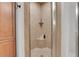 Tiled shower with built-in shelving at 4992 Price Dr, Suwanee, GA 30024