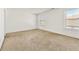 Spacious carpeted bedroom with natural lighting from two bright windows at 1159 Fort Marcy Park, Lawrenceville, GA 30044
