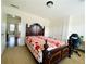 Bedroom with tan carpet, natural light, and access to other rooms at 1159 Fort Marcy Park, Lawrenceville, GA 30044