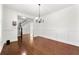 Bright dining room featuring hardwood floors and staircase view at 1159 Fort Marcy Park, Lawrenceville, GA 30044
