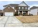 Charming two-story brick home with well-maintained lawn and inviting front porch at 1159 Fort Marcy Park, Lawrenceville, GA 30044