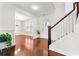 Open foyer featuring hardwood floors, staircase and entry to the living room at 1159 Fort Marcy Park, Lawrenceville, GA 30044