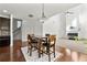 Open-concept living room with fireplace, tall ceilings, and natural light at 1159 Fort Marcy Park, Lawrenceville, GA 30044
