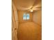 Cozy bedroom featuring a ceiling fan, neutral carpet, a window, and a closet at 2020 Wynfield Point Dr, Buford, GA 30519