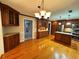 Well-appointed kitchen area with custom cabinetry, an island, and stainless steel appliances at 2020 Wynfield Point Dr, Buford, GA 30519