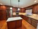 Updated kitchen with stainless steel appliances, custom cabinets, and a granite-topped island at 2020 Wynfield Point Dr, Buford, GA 30519