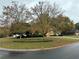 Serene street view showcasing well-manicured lawns and mature trees lining the neighborhood at 2020 Wynfield Point Dr, Buford, GA 30519