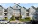 Well-maintained condo building exterior with balconies and landscaped grounds at 4100 Paces Se Walk # 3205, Atlanta, GA 30339