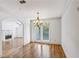 Bright dining room with hardwood floors and access to a patio at 4100 Paces Se Walk # 3205, Atlanta, GA 30339
