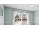 Bedroom featuring a ceiling fan and natural light from the window at 1211 Promontory Path, Marietta, GA 30062