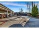 Outdoor patio with seating area and green landscaping at 22107 Harvest Ridge Ln # 22, Alpharetta, GA 30022
