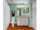 Bathroom with granite countertop, shower and tile flooring at 22107 Harvest Ridge Ln # 22, Alpharetta, GA 30022