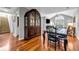 Elegant dining area features hardwood floors, an arched window, and plenty of space for entertaining guests at 22107 Harvest Ridge Ln # 22, Alpharetta, GA 30022