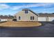 Exterior side view of home with two car garage at 22107 Harvest Ridge Ln # 22, Alpharetta, GA 30022
