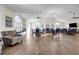 Inviting great room features vaulted ceilings, lots of chairs and natural lighting at 22107 Harvest Ridge Ln # 22, Alpharetta, GA 30022