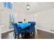 Dining room with hardwood floors, pendant lighting and backyard access at 374 Lamancha Ct, Lawrenceville, GA 30044