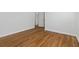 Clean, bright bedroom featuring hardwood floors and neutral walls, ready for personalization at 1652 Pine Cir, Austell, GA 30168