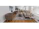 Comfortable living room with contemporary furnishings, stylish rug, and bright natural light at 1652 Pine Cir, Austell, GA 30168