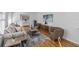 Well-decorated living room with a sofa, armchairs, and a view into the dining area at 1652 Pine Cir, Austell, GA 30168