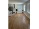 Spacious living area with hardwood floors, lots of sunlight and easy access to the kitchen at 1652 Pine Cir, Austell, GA 30168