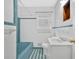 Bathroom with tiled walls, tub, and sink at 2344 Hollyridge Sw Dr, Marietta, GA 30060