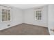 Bedroom featuring neutral carpet and natural light from large windows at 2344 Hollyridge Sw Dr, Marietta, GA 30060