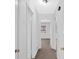 Hallway with multiple doorways leading to bedrooms or bathrooms at 2344 Hollyridge Sw Dr, Marietta, GA 30060
