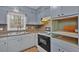 Kitchen featuring updated appliances and ample counter space at 2344 Hollyridge Sw Dr, Marietta, GA 30060
