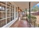A cozy porch with tiled flooring and wrought iron railings offer curb appeal at 2344 Hollyridge Sw Dr, Marietta, GA 30060