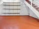 Finished basement space with storage shelves and staircase at 835 Glendale Ne Ter # 6, Atlanta, GA 30308