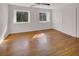 Spacious bedroom with hardwood floors, large windows, and a closet at 835 Glendale Ne Ter # 6, Atlanta, GA 30308