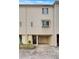 Townhouse exterior with parking and a well-kept flower bed at 835 Glendale Ne Ter # 6, Atlanta, GA 30308