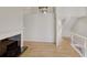 Bright living room with fireplace, hardwood floors, and open floor plan at 835 Glendale Ne Ter # 6, Atlanta, GA 30308
