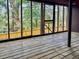 Enclosed porch featuring a view of the trees, wood planks, and natural light at 835 Glendale Ne Ter # 6, Atlanta, GA 30308