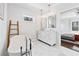 Bright bathroom with a soaking tub, double vanity, and modern fixtures at 1309 Arnold Ne Ave, Atlanta, GA 30324