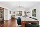 Dining room with stylish lighting, elegant decor, and a large dining table at 1309 Arnold Ne Ave, Atlanta, GA 30324